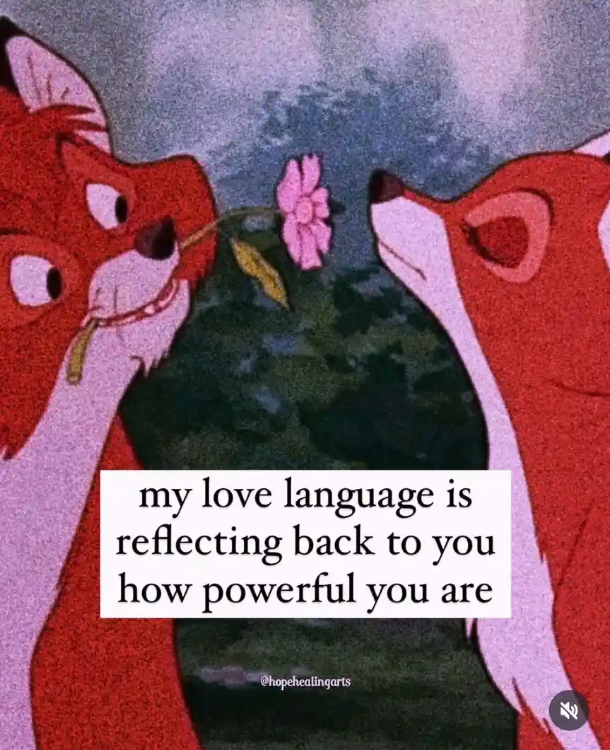 Two red foxes from an animated film are shown in a close-up, one holding a pink flower and looking at the other who is…