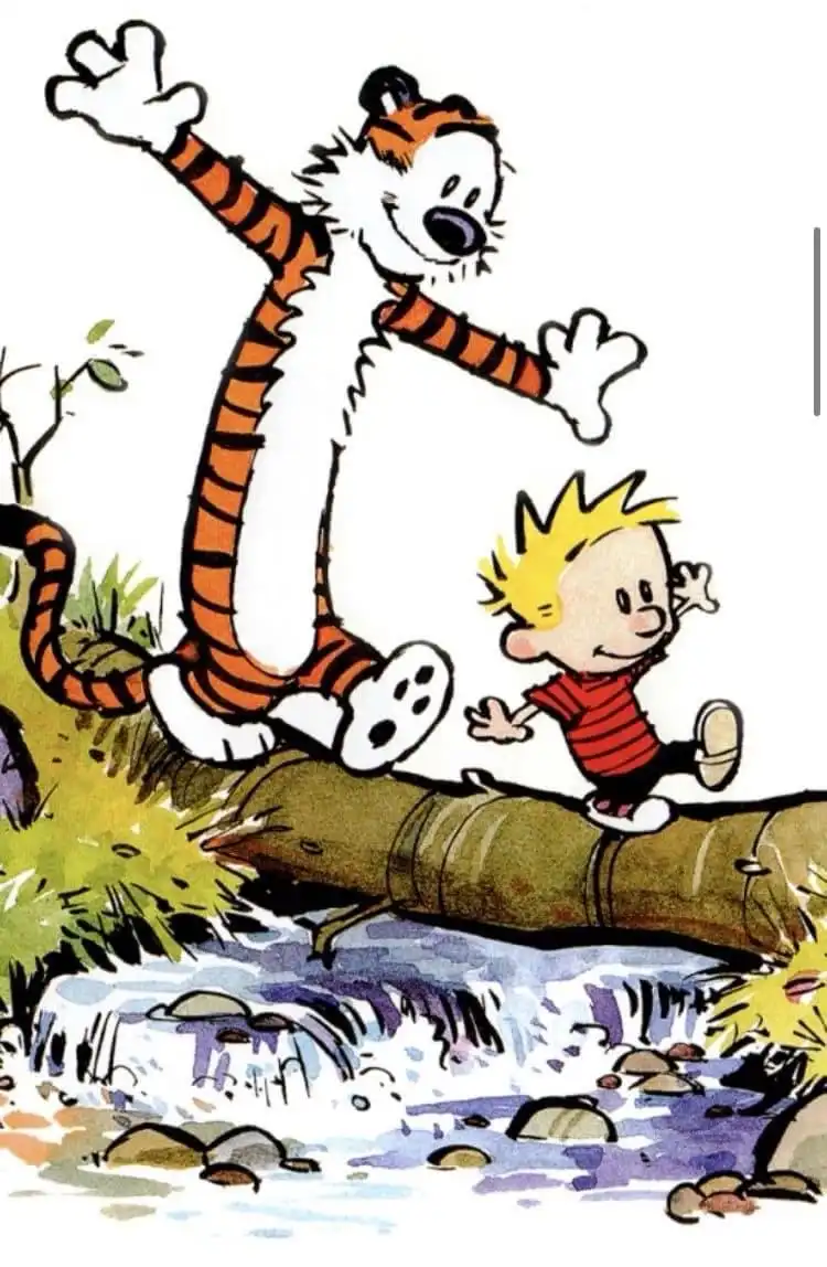 A classic Calvin and Hobbes comic panel shows the boy Calvin in a red striped shirt running across a log over a stream…