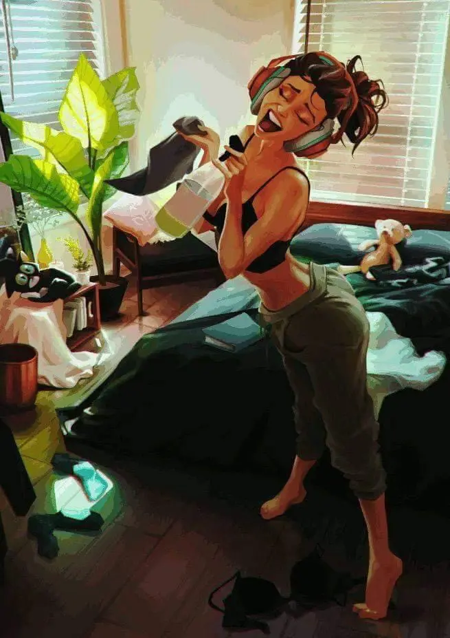 A woman in a bedroom, wearing headphones and holding a bottle, laughs joyfully while standing on one foot. Clothes are…
