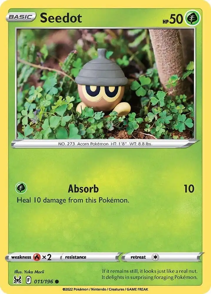 This is a Pokémon trading card for Seedot, a small acorn-like creature with large eyes and a gray cap, peeking out from…