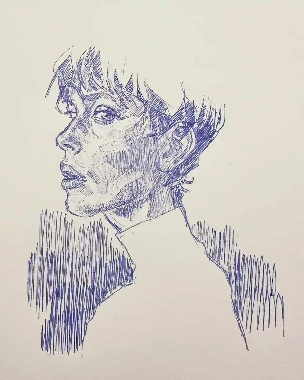 A blue ink sketch shows a person's head and shoulders in profile, looking upward with a serious expression. The drawing uses…