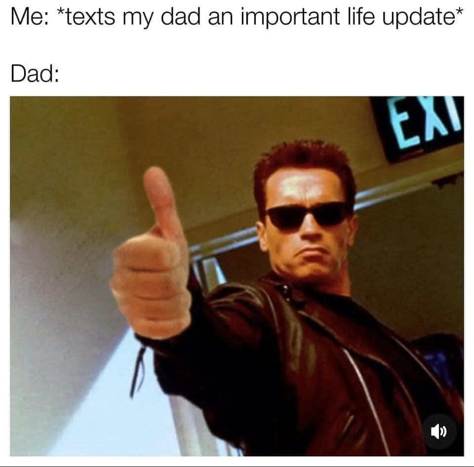 The image shows Arnold Schwarzenegger as the Terminator, giving a firm thumbs-up gesture while wearing sunglasses and a…