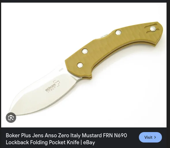 A close-up product photo of a folding pocket knife with a mustard-yellow handle and silver blade, branded 'Boker Italy'. The…