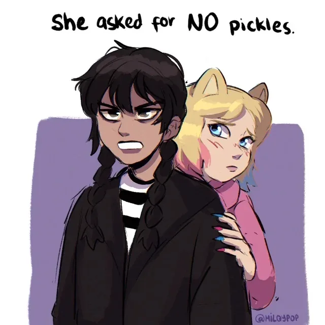 An anime-style illustration shows a dark-haired person with braids and an angry expression, while a blonde cat-eared person…
