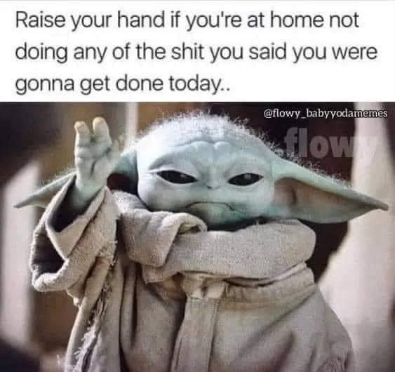 A close-up image of Grogu (Baby Yoda) from Star Wars, wearing his signature beige robe and raising his right hand in a…