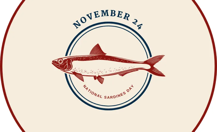 A vintage-style circular emblem features a red line drawing of a sardine fish centered within concentric blue and red…