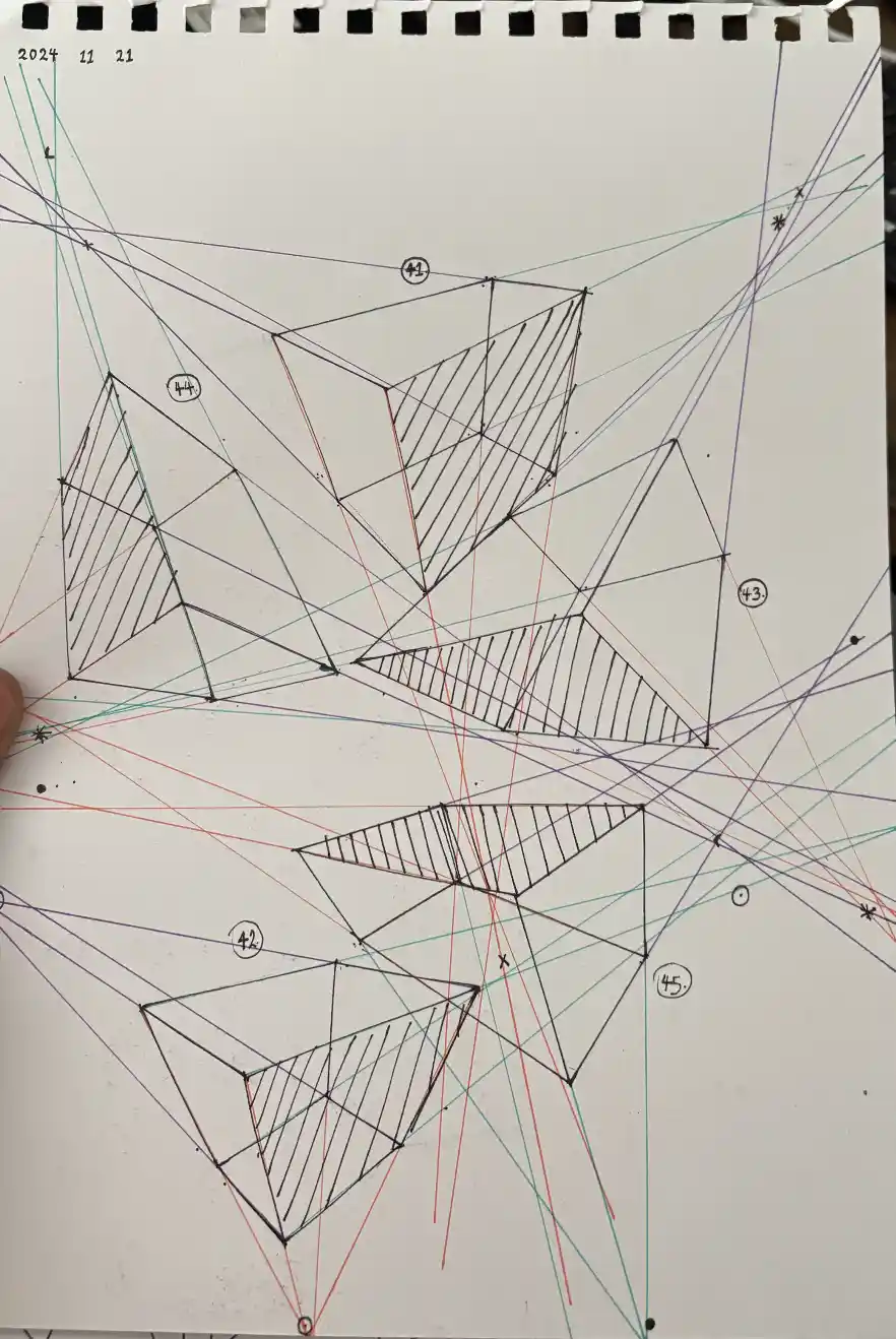 A close-up photo of a spiral-bound notebook page filled with complex, overlapping geometric drawings in black, red, and teal…