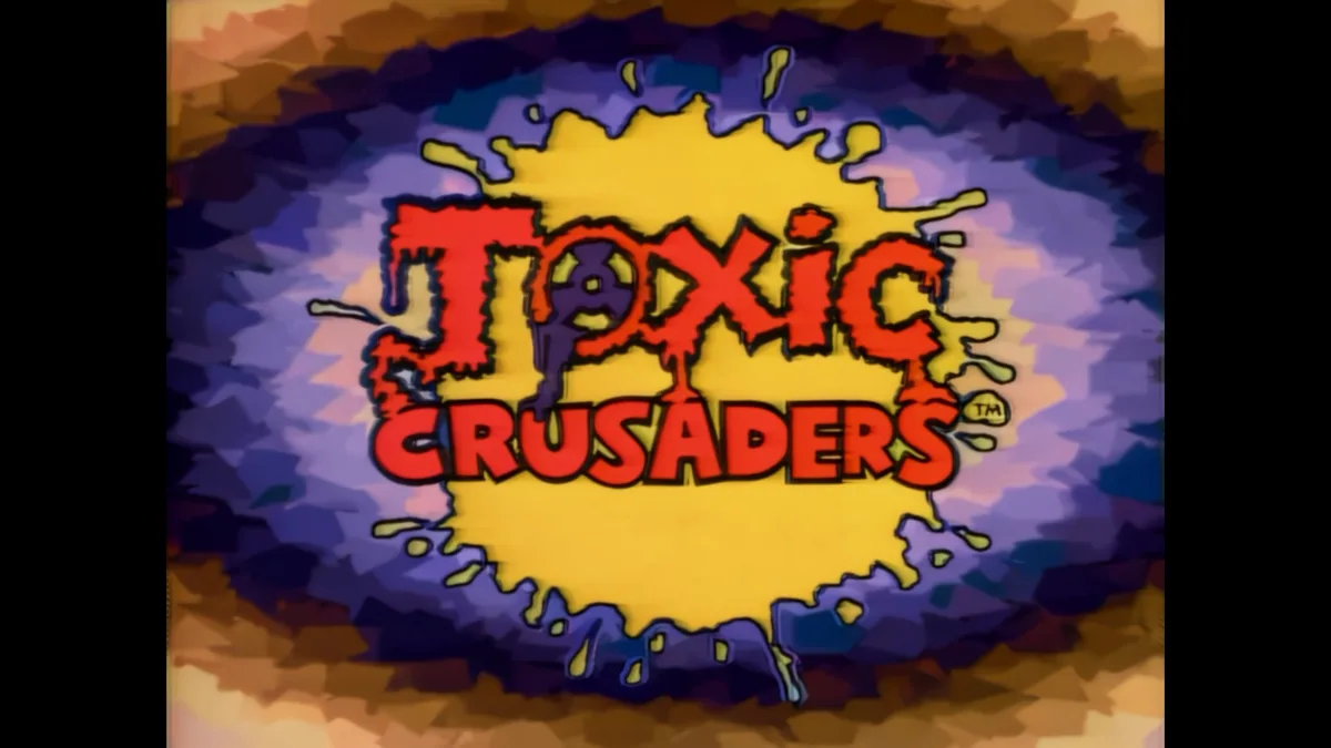 The image displays the title card for the animated TV show 'Toxic Crusaders,' featuring the words 'TOXIC CRUSADERS' in bold…