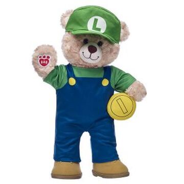 a brown teddy bear dressed as the video game character Luigi, wearing a green cap with an 'L', green shirt, blue overalls…