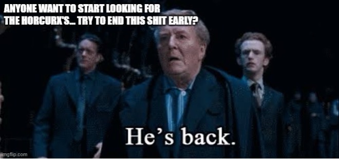 A still from the Harry Potter movies shows a man in a dark suit with a shocked expression, flanked by two other men in…