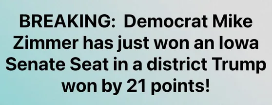 The image displays bold black text on a light blue gradient background. The text reads: 'BREAKING: Democrat Mike Zimmer has…