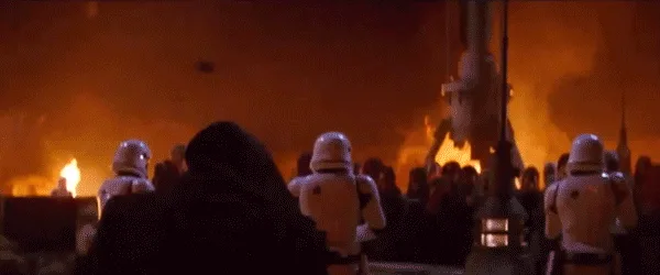 A sequence of frames from Star Wars: The Force Awakens shows Kylo Ren in his black hooded robe, holding a red lightsaber…