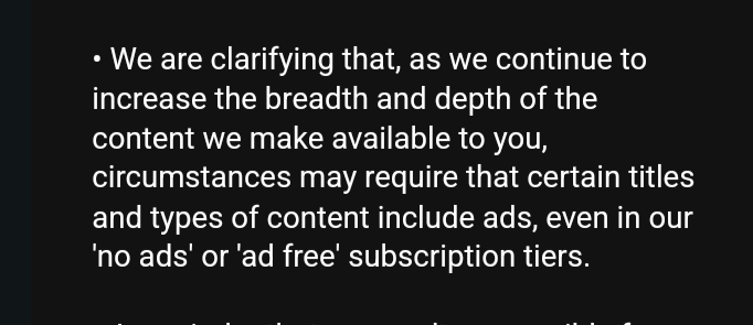 A black background with white text displaying a formal, corporate-style disclaimer about content and ads. The text explains…