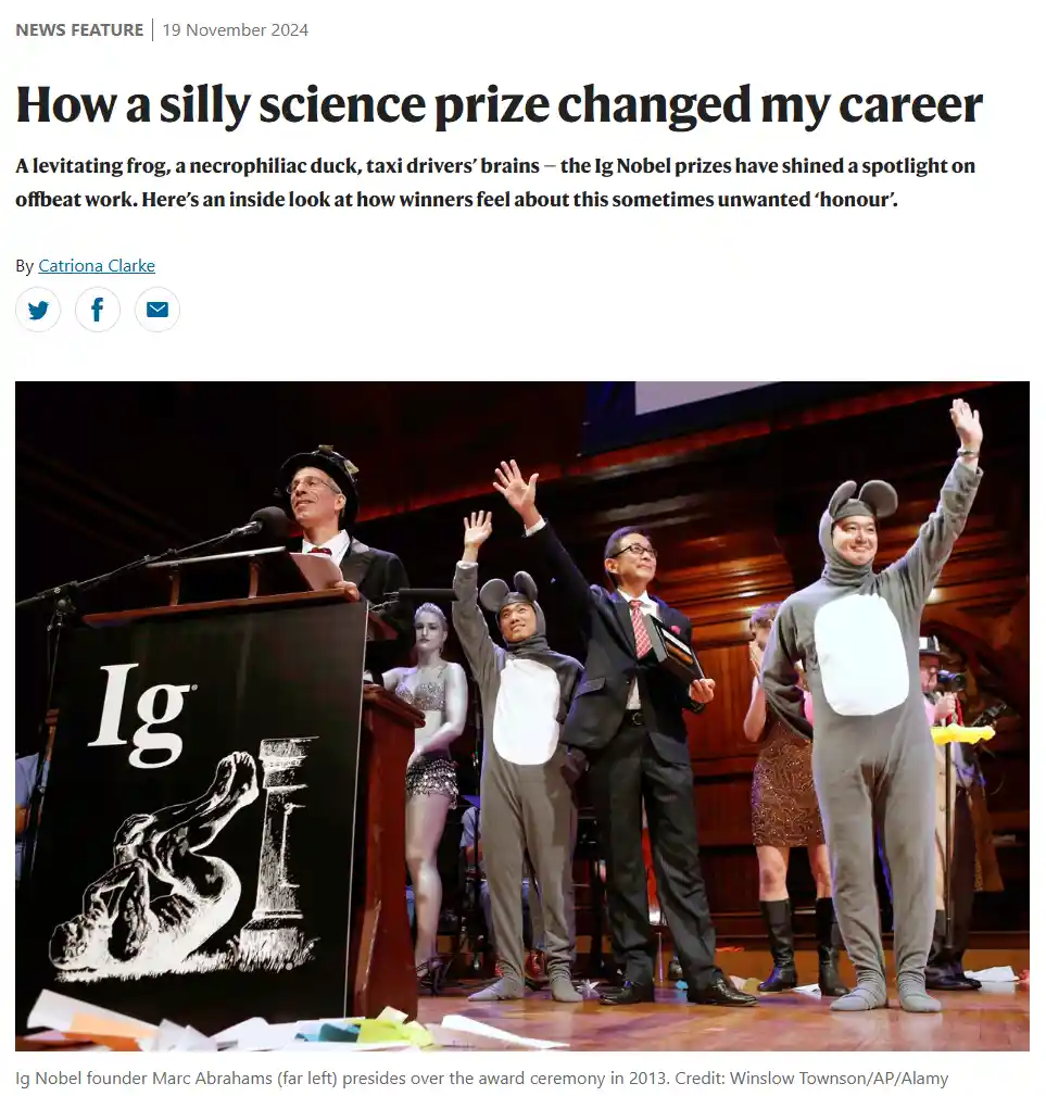 A news article screenshot shows Ig Nobel prize winners on stage in 2013, including two men in full-body mouse costumes with…