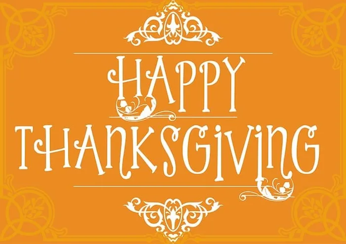 An ornate, festive orange background with white decorative flourishes and the text 'HAPPY THANKSGIVING' in a stylized…