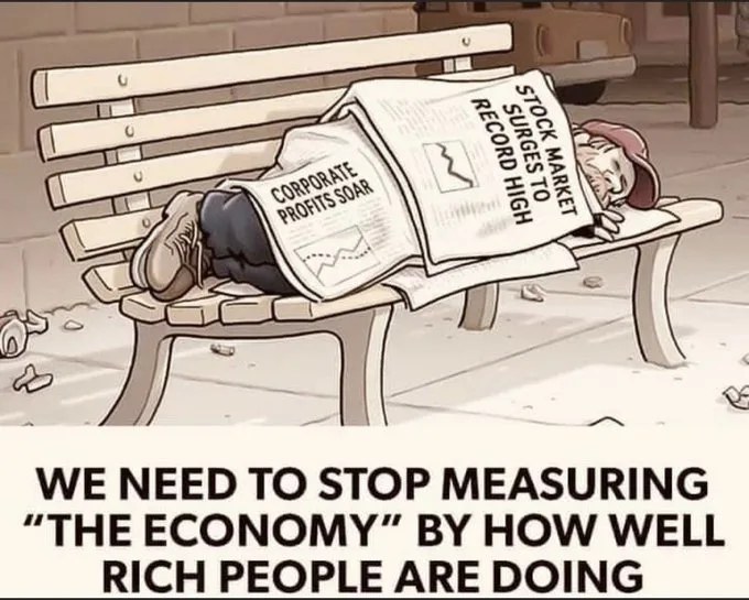 A cartoon depicts a homeless man sleeping on a park bench, covered by a newspaper with headlines like 'STOCK MARKET SURGES…