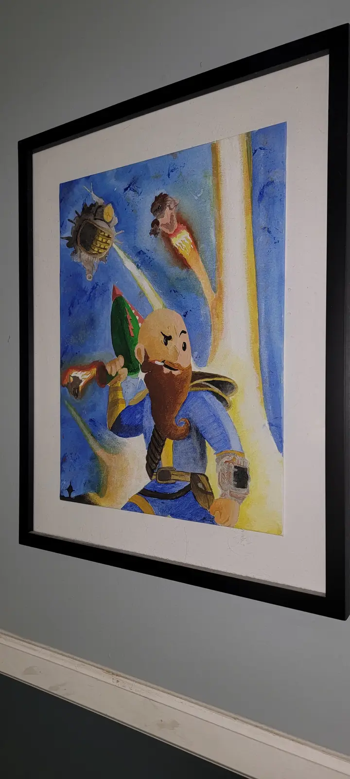 A framed painting on a wall depicts a bald, bearded man in blue armor holding a green weapon, with two other figures in the…