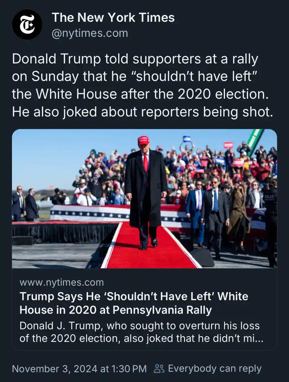 A screenshot of a New York Times tweet shows a photo of Donald Trump walking down a red carpet at a rally, wearing a red…