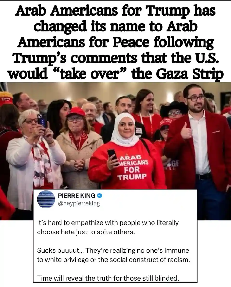 The image shows a crowd of people, many wearing red clothing and Trump-related items, including a woman in a red sweatshirt…