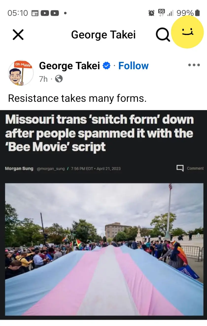 A screenshot of a social media post by George Takei showing a large trans pride flag being held by a crowd at an outdoor…