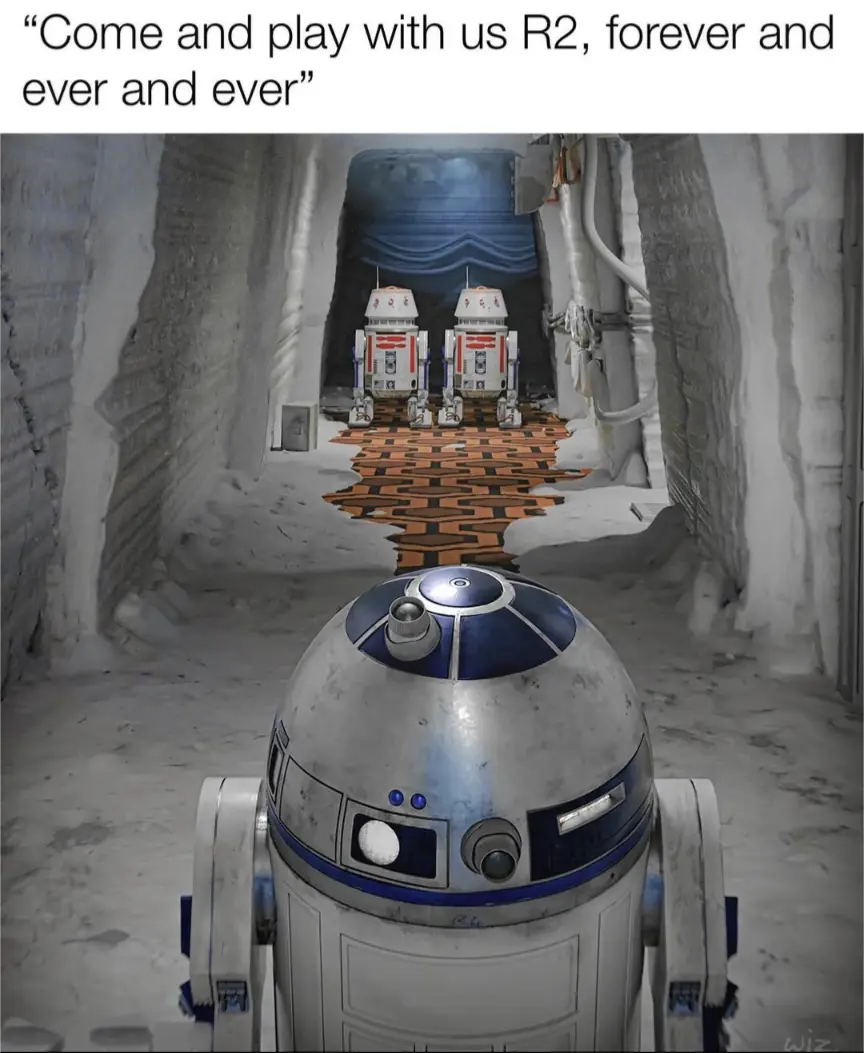 A first-person view from an R2-D2 droid looking down a snowy, rocky corridor toward two identical R2-D2s standing at the…