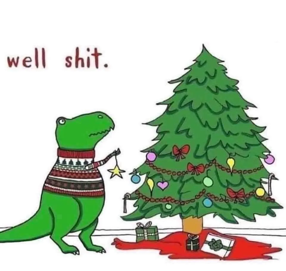 A cartoon green dinosaur wearing a festive patterned sweater stands before a fully decorated Christmas tree, holding a star…