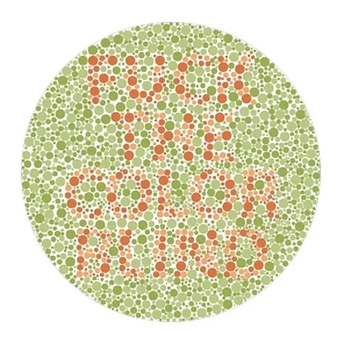 A circular Ishihara-style color blindness test plate filled with green and orange dots, with the phrase 'FUCK THE COLOR…