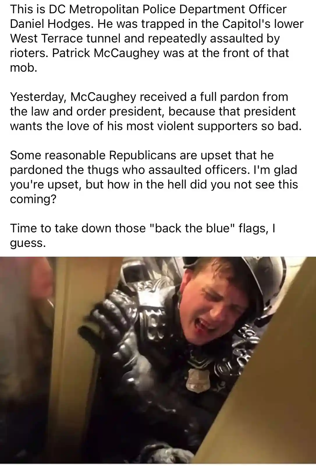 The image shows a DC Metropolitan Police officer, Daniel Hodges, in full riot gear, visibly distressed and screaming while…