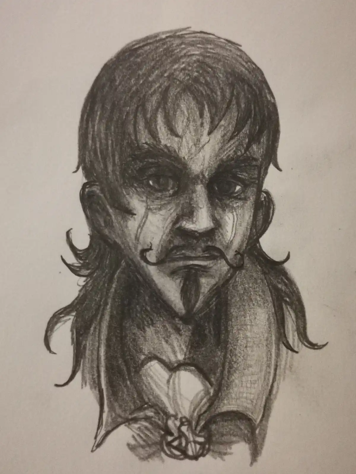 A charcoal sketch of a man with a mustache and goatee, wearing a shirt with a fleur-de-lis emblem, looking intensely at the…