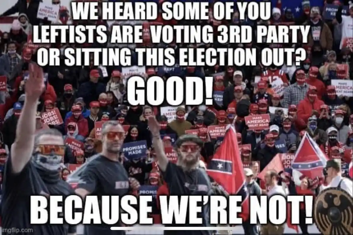A crowd of people wearing red hats and holding 'Make America Great Again' signs, some with Confederate flags, are shown with…