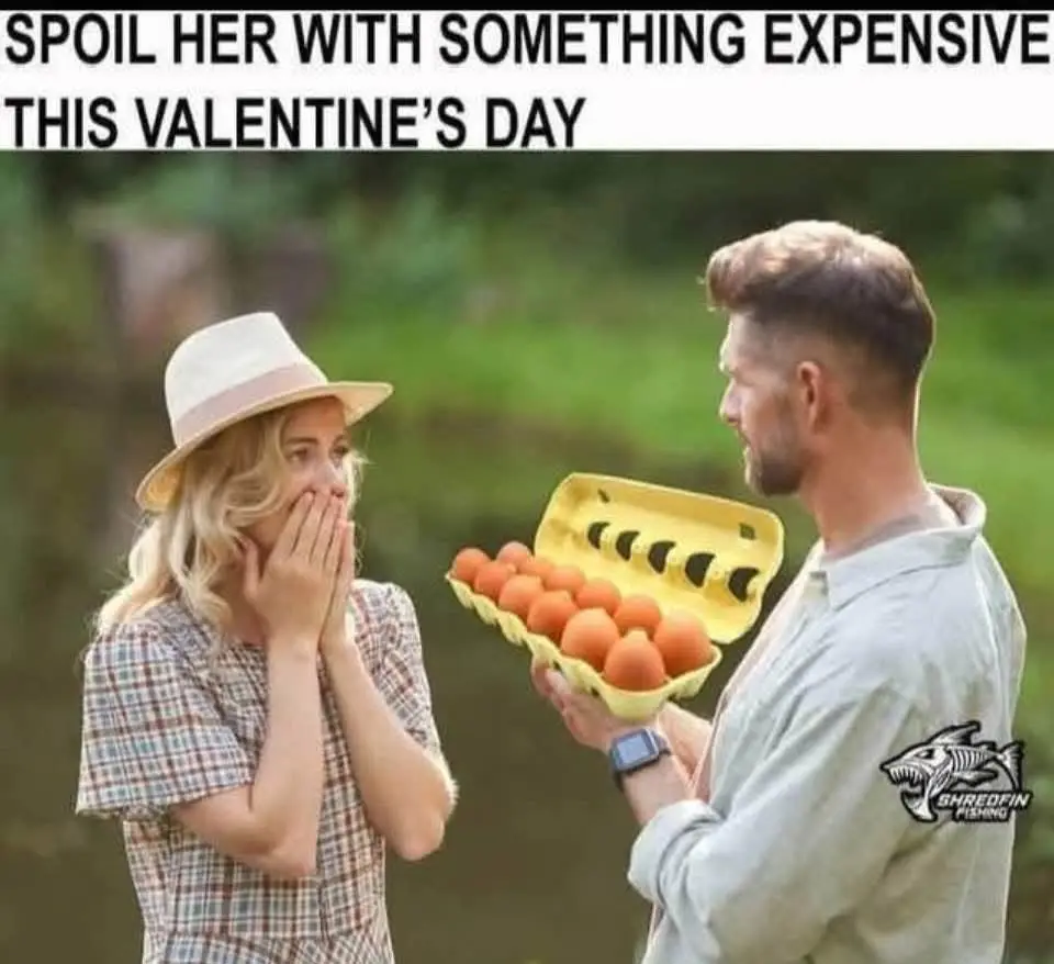 A man holds a yellow carton of eggs toward a woman wearing a plaid shirt and white hat, who covers her mouth in shock. The…