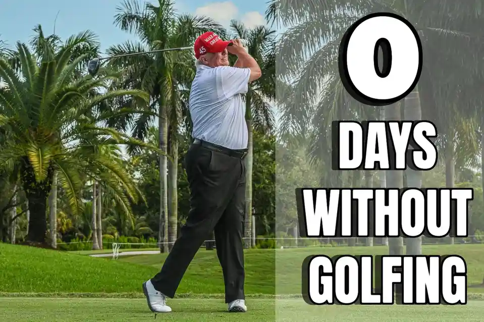 A man wearing a red 'Make America Great Again' cap and a white polo shirt is mid-swing on a golf course with palm trees in…