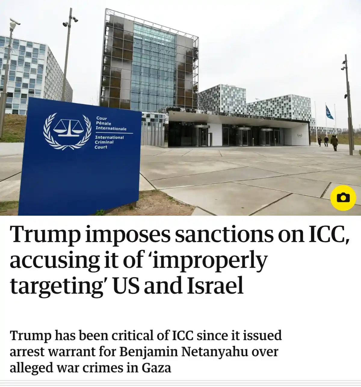 The image shows the exterior of the International Criminal Court building with its blue sign featuring the court's logo and…