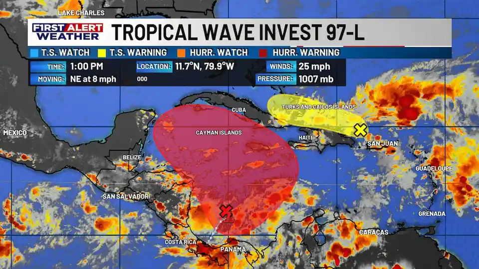 A weather map from 'First Alert Weather' shows a tropical wave labeled 'INVEST 97-L' with a large red circle centered over…