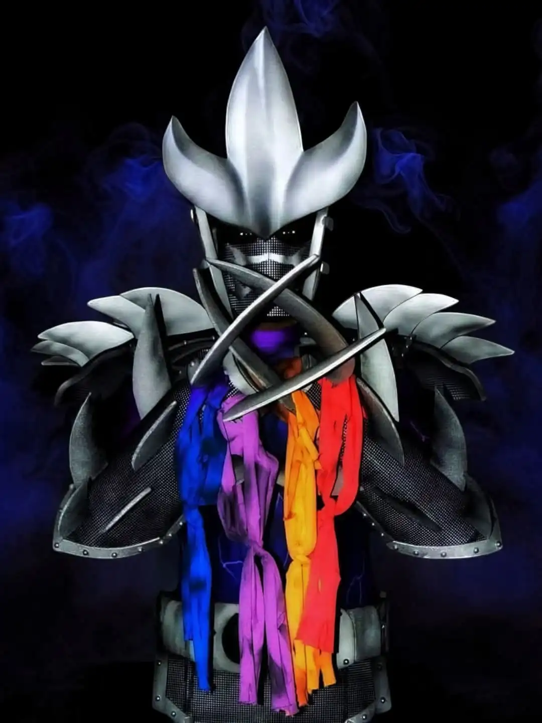 A person in elaborate silver armor with a spiked helmet and crossed swords, standing against a dark, smoky background…