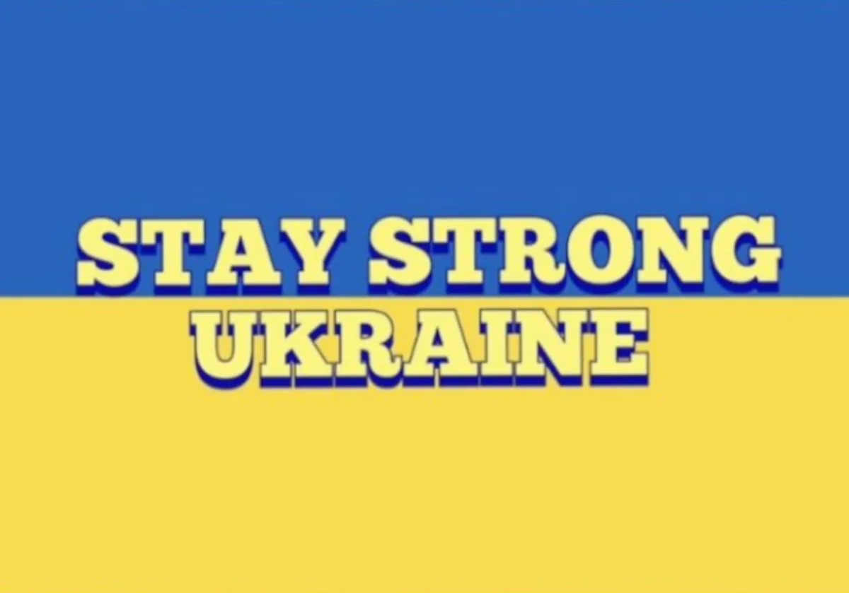 The image displays the Ukrainian flag, with its horizontal blue and yellow stripes, overlaid with bold, yellow, 3D-style…
