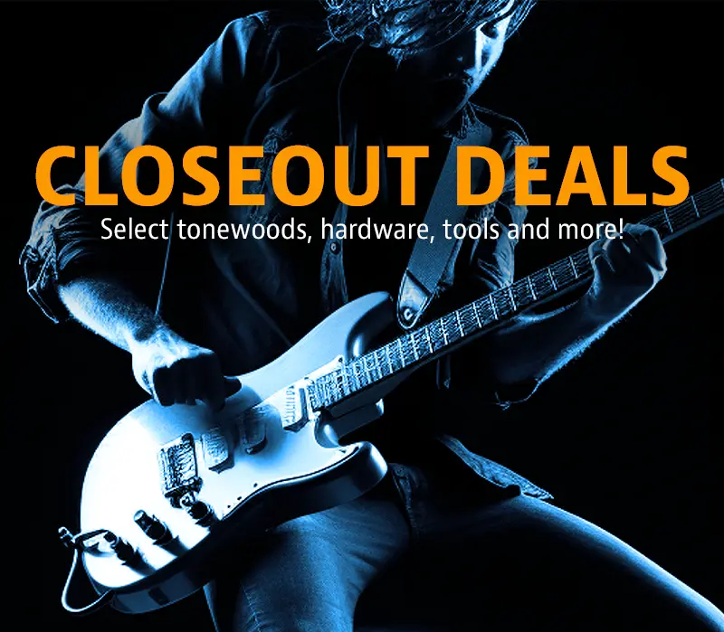 A person with dark hair plays a white electric guitar against a dark background with blue lighting. Large orange text reads…