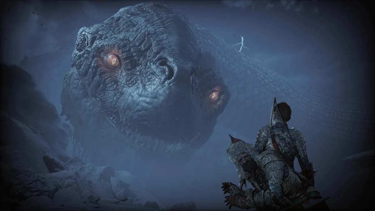A massive, icy, scaled dragon with glowing orange eyes looms over two armored warriors in a snowy, mountainous landscape…
