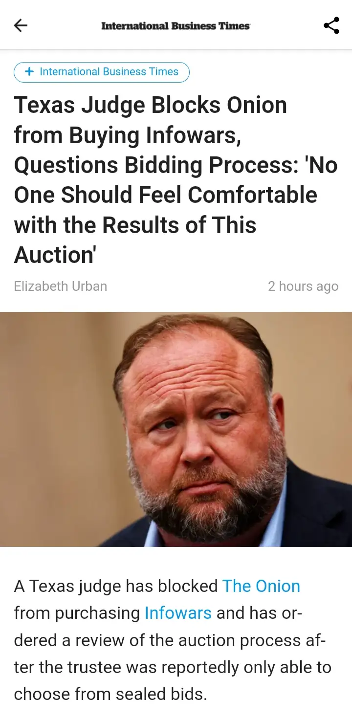 A screenshot of an International Business Times article shows a photo of a man with a beard and concerned expression. The…
