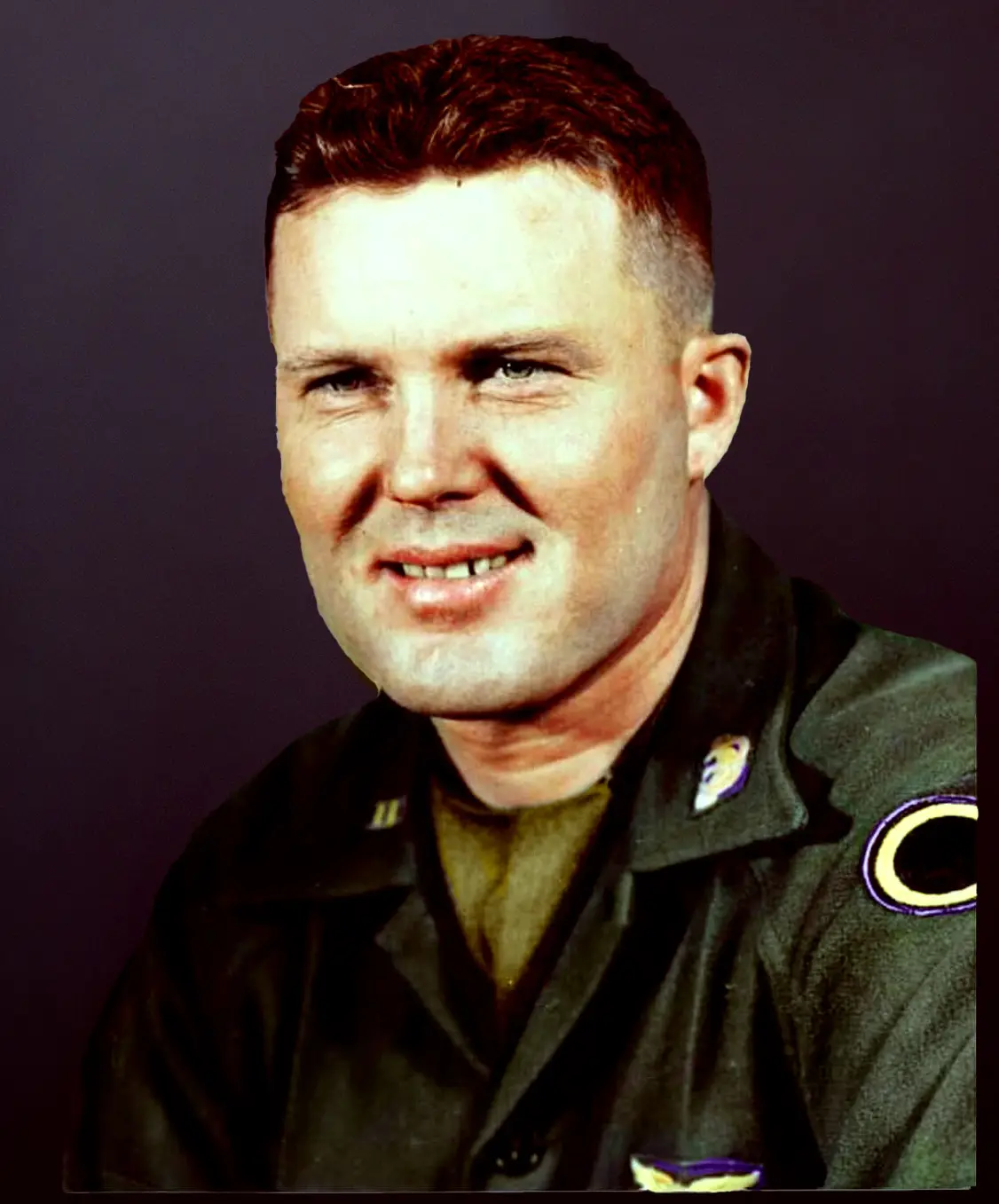A vintage military portrait of a smiling man in a dark uniform with visible insignia, overlaid with the text 'i'm not a fan…