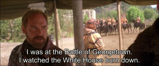 A man with a beard and intense expression looks forward, overlaid with text stating he was at the Battle of Georgetown and…