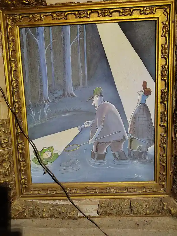 A framed cartoon painting depicts two men in waders standing in a pond, shining a flashlight on a frog sitting on a lily…