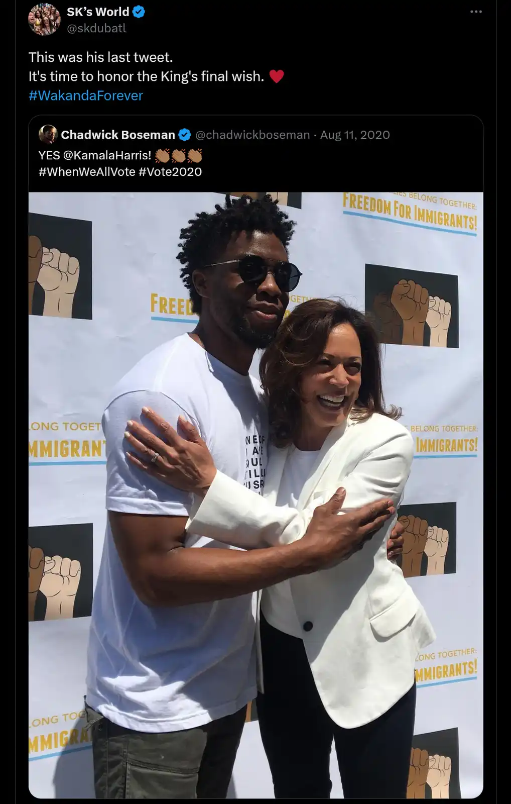 A photo shows actor Chadwick Boseman and Kamala Harris embracing in front of a 'Freedom for Immigrants!' banner. The image…