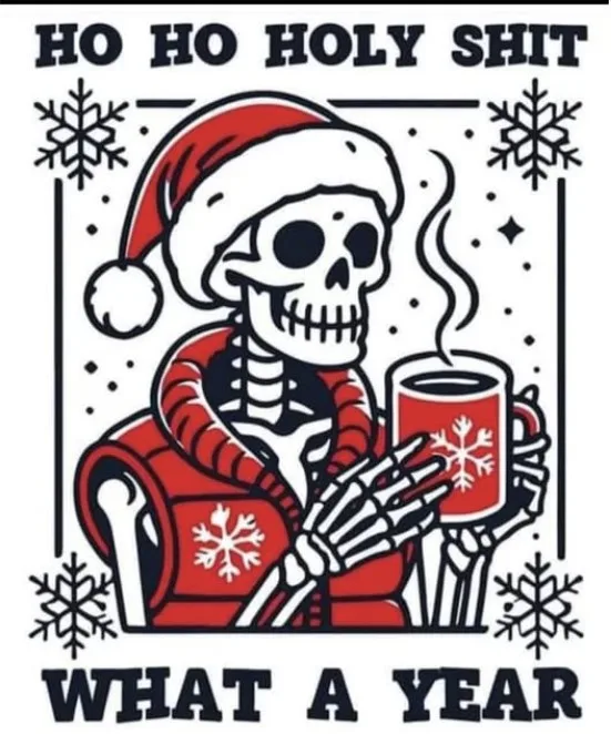 A cartoon skeleton wearing a red Santa hat and a red vest with snowflake patterns sits holding a steaming red mug with a…