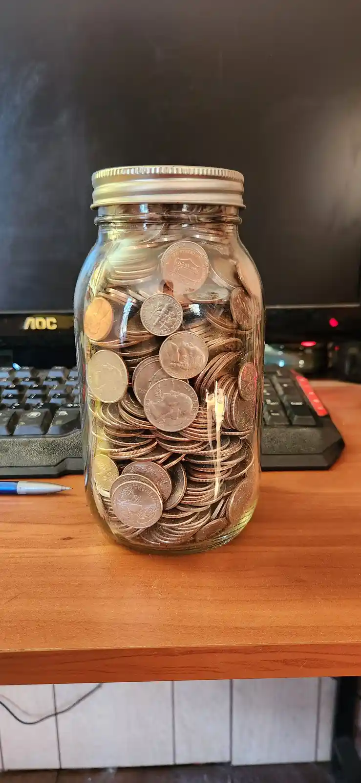 Guess the Cash: How Much is in This Jar?