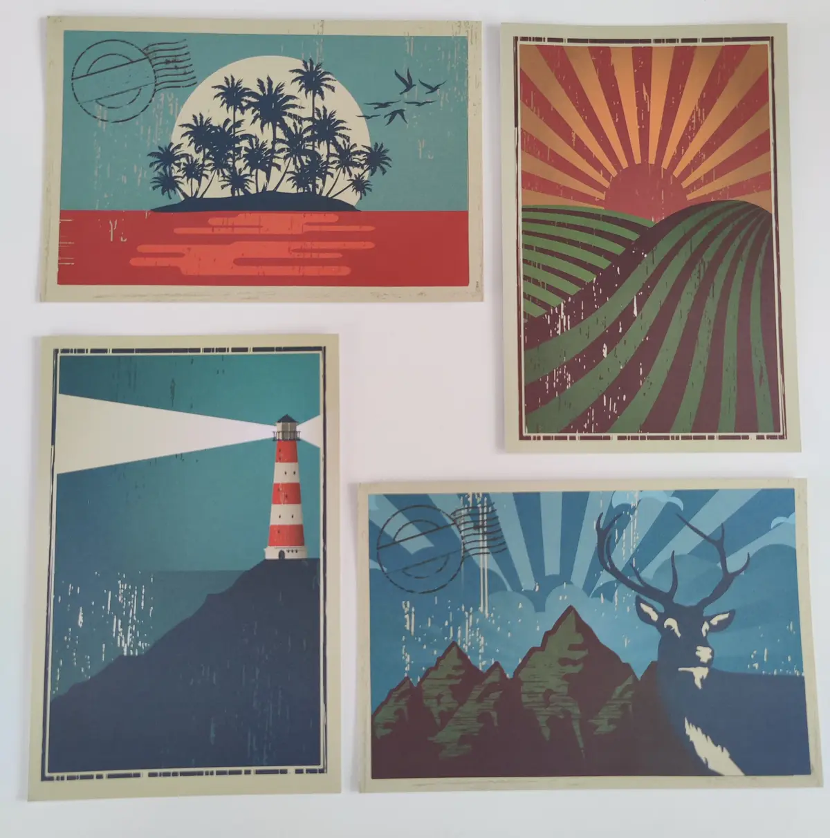 Four vintage-style illustrated postcards are displayed, featuring a tropical island with palm trees and a moon, a sunrise…