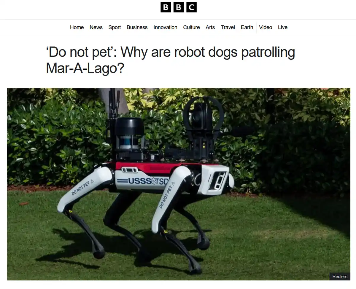 A robotic dog, resembling a quadruped with a camera and sensors mounted on its back, stands on green grass in front of…