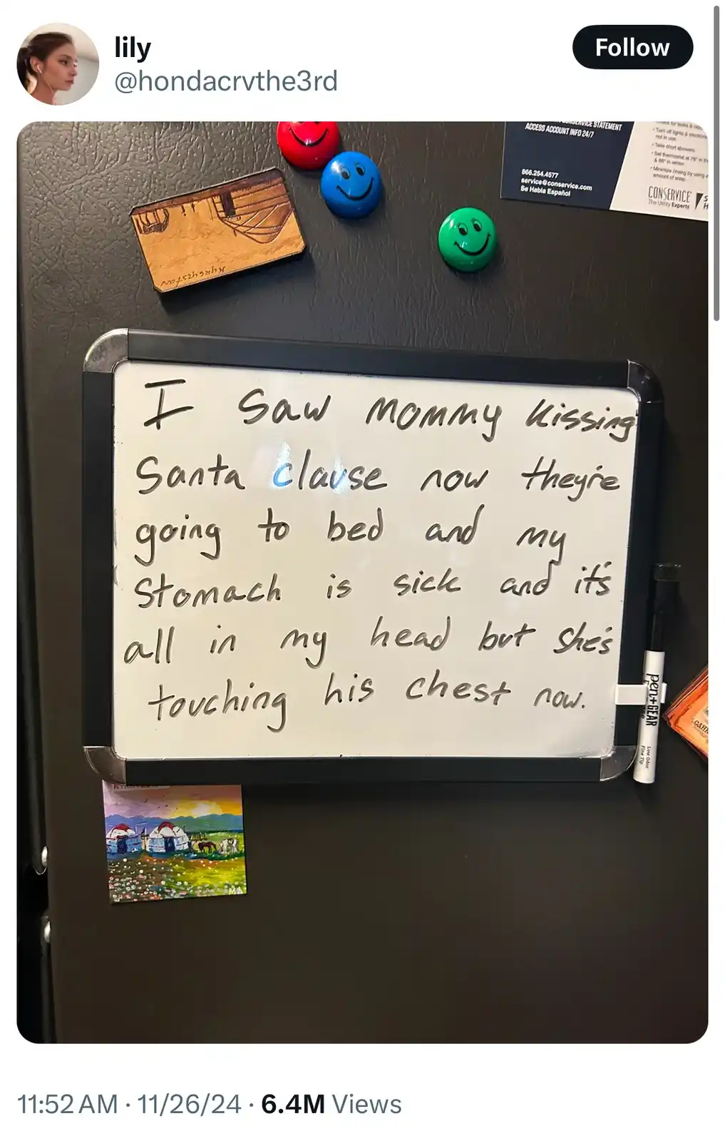 A whiteboard magnet attached to a black refrigerator displays handwritten text describing a child's innocent and confused…