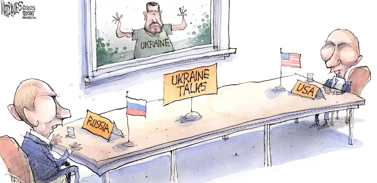 A political cartoon depicts a negotiation table with two seated figures labeled 'Russia' and 'USA', each with their…