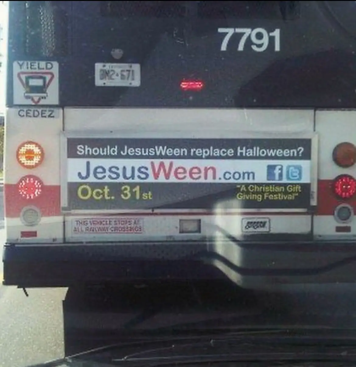 The back of a public transit bus, number 7791, displays a large advertisement asking if JesusWeen should replace Halloween…